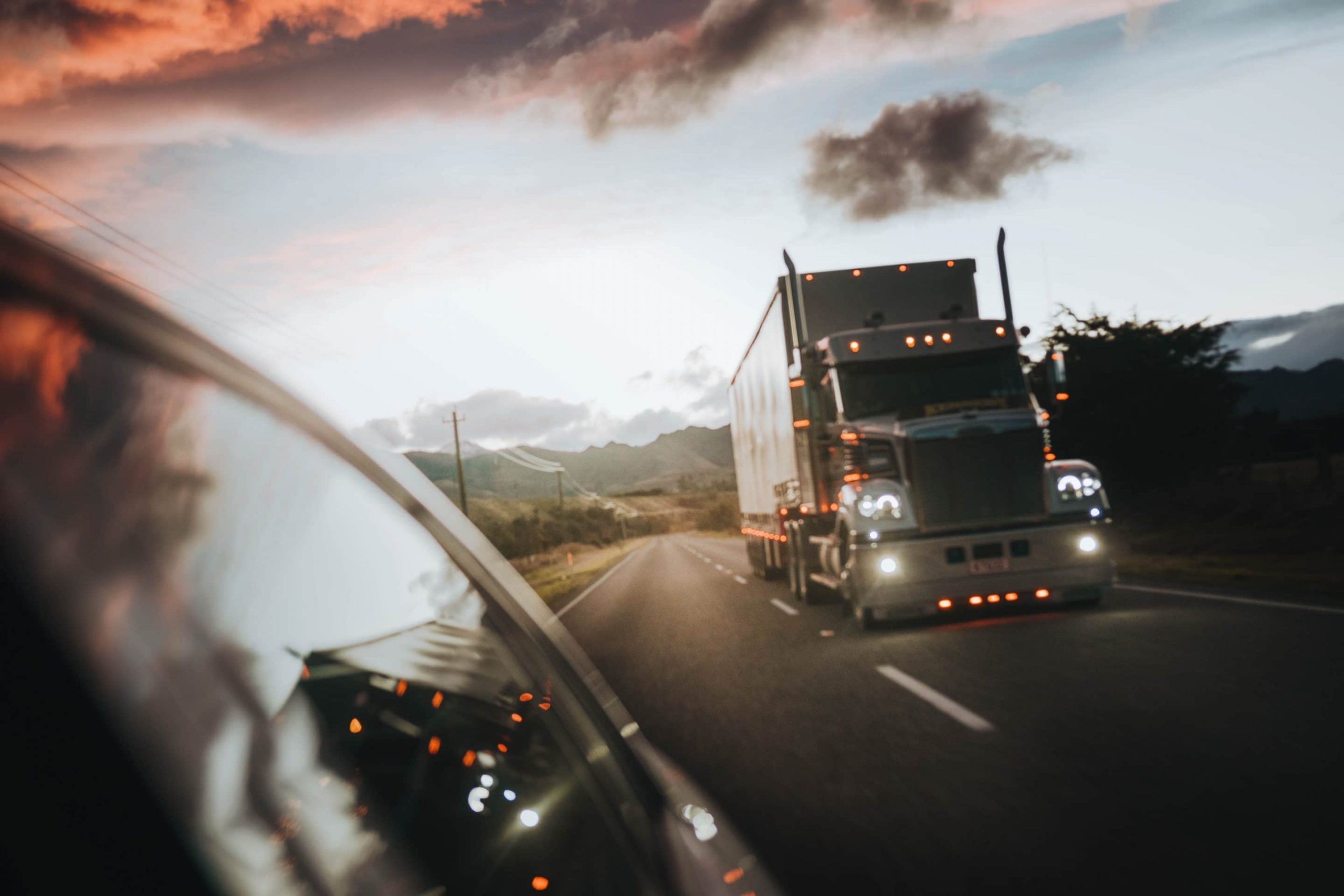 image of truck driving on highway