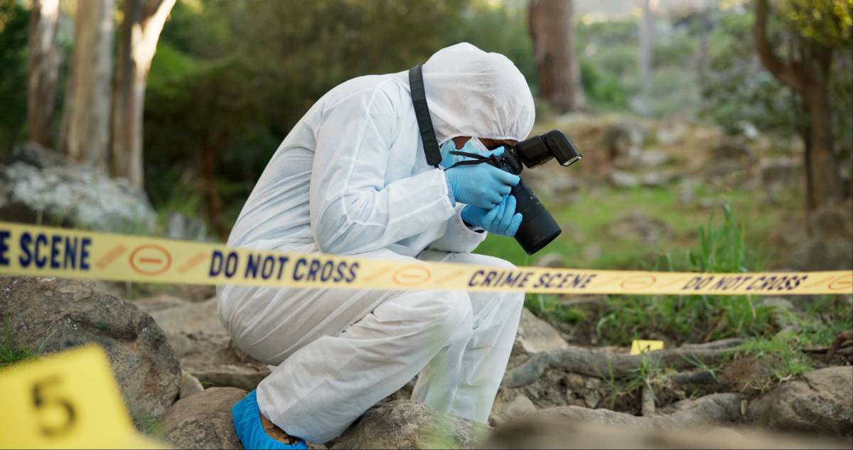 individual taking photos of evidence