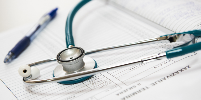 stethoscope and medical documents